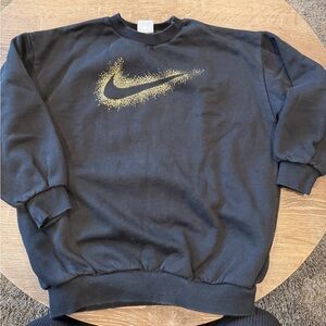Girl’s Nike Black Crewneck Sweatshirt with Gold Swoosh